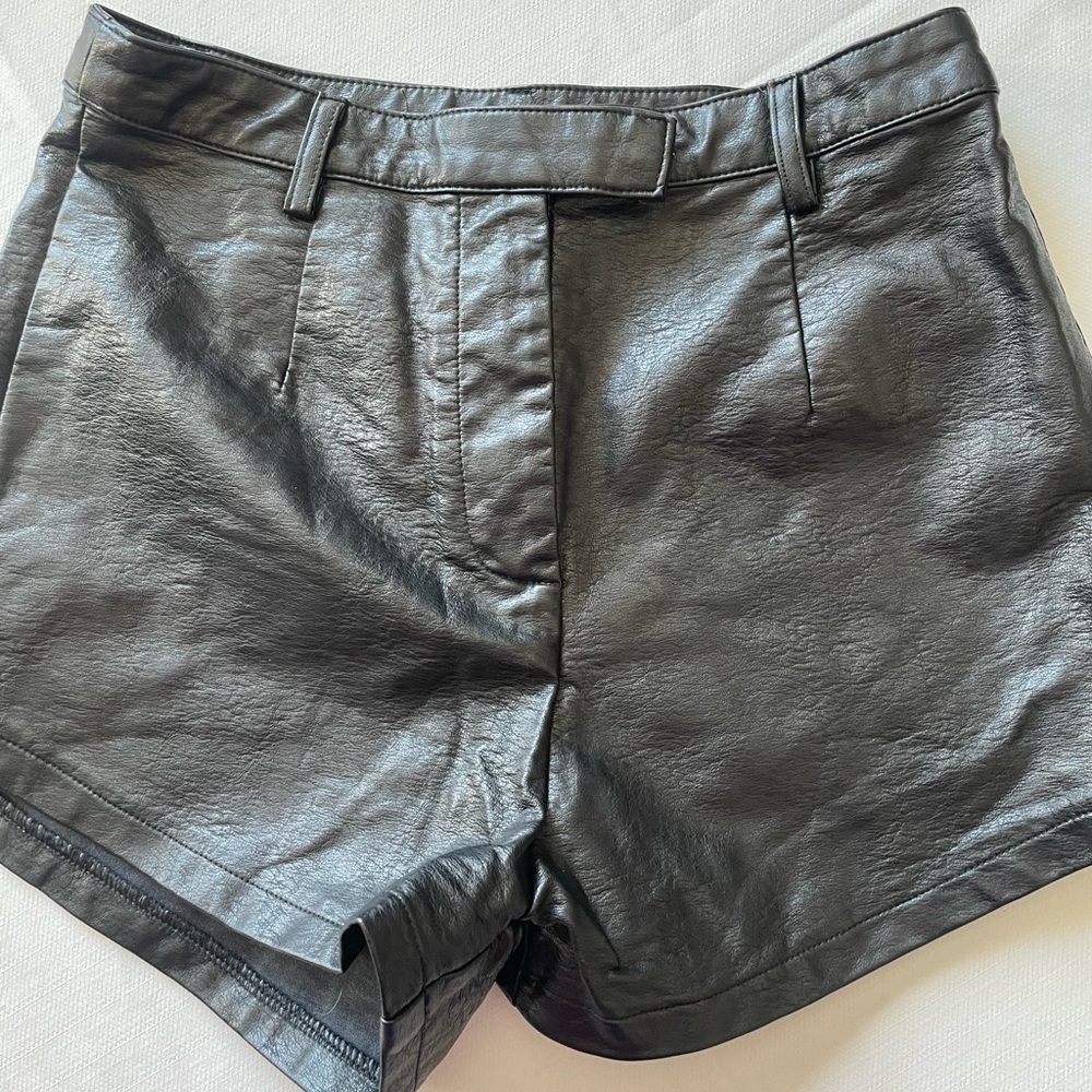 Princess Polly black faux leather high waisted shorts. Size 4
